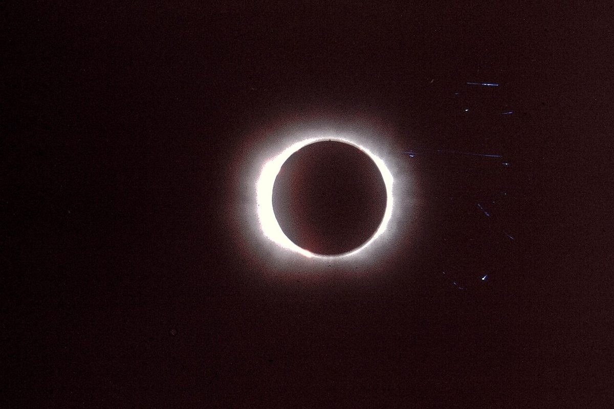 The totally eclipsed Sun, a dark disc ringed by the white corona, on 26 February 1979.