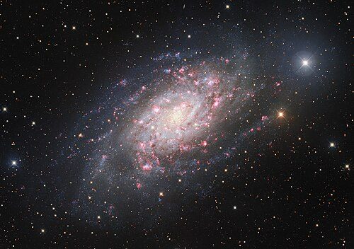 NGC 2403 - A Galaxy of Birth and Death (iotw2221a)