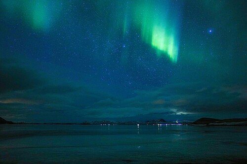 039 Northern lights over Mývatn (Iceland) Photo by Giles Laurent