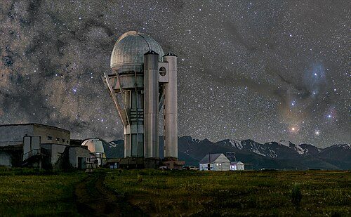 Assy-Turgen Observatory against the backdrop of the center of the Milky Way and the star-f